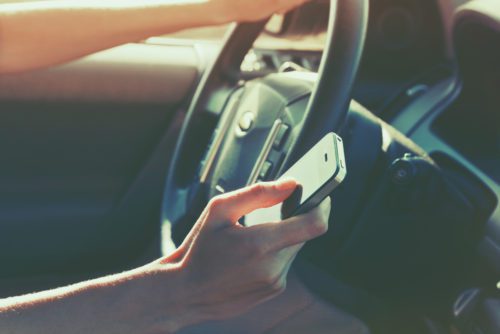 Gesetzliche Unfallversicherung - Wegeunfall - Lesen einer SMS auf privatem Handy